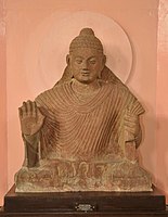 Buddha in Abhaya Mudra. Kushana-Gupta transitional period. Circa 3rd-4th century, Mathura.[45]