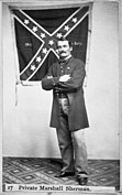 Marshall Sherman in 1864 with the 28th Virginia battle flag