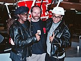 Milli Vanilli with NARAS president C. Michael Greene (center)