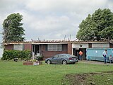 EF2 damage: At this intensity, tornadoes have a more significant impact on well-built structures, removing the roofs, and collapsing some exterior walls of poorly built structures. EF2 tornadoes are capable of destroying mobile homes and generating large amounts of flying debris. This home completely lost its roof, but its walls remained intact. Between 15 and 19% of all annual tornadoes in the U.S. are rated EF2.