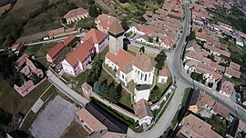 Aerial view of Ațel/Hatzeldorf with the local medieval Evangelical Lutheran fortified church in the centre