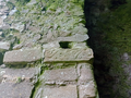 Carved stone detail inside the church similar in shape and size to the sheela-na-gig