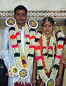 J-17. A newly married couple at the Meenakshi temple in Madurai, Tamil Nadu