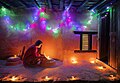 Image 15Woman lighting a diyo during Tihar, by Mithun Kunwar (edited by Radomianin) (from Wikipedia:Featured pictures/Culture, entertainment, and lifestyle/Religion and mythology)