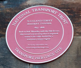 A plaque marking the north end of the Scotland Street Tunnel.