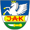 Coat of arms of Komňa