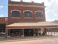 J. Cruse Christmas Gallery downtown; behind the gallery is the OS Museum, developed by Giles McCrary.