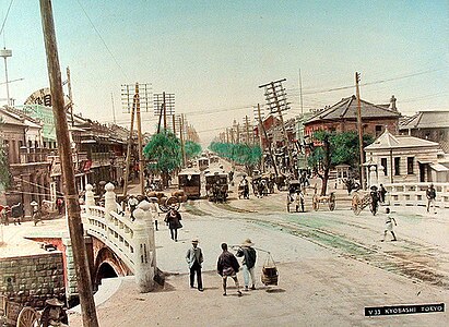 Attributed to Adolfo Farsari (1841–1898) A handcolored albumen photograph of Kyobashi as it looked in the 19th century.