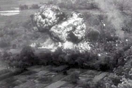 French napalm bomb exploded over Vietminh force. 1953 December. This image during the (French) First Indochina War, conjuring up the destruction of the napalm on the human flesh,[80][at] portended what was to come more than ten years later during the (American) Second Indochina War.