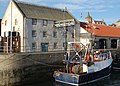 Ice manufactured in this ice house is delivered down the Archimedes screw into the ice hold on the boat, Pittenweem