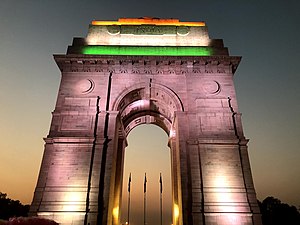 The gate is illuminated with colors of the Indian flag