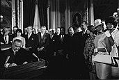 Johnson signing the Voting Rights Act into law