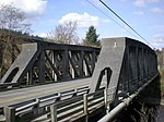 SR 162 crosses the Puyallup River northwest of Orting on the McMillin Bridge opened in 1934