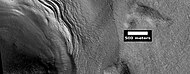 Close view of lobate debris apron around mesa, as seen by HiRISE under HiWish program Brain terrain is visible.