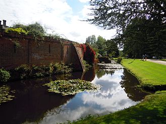 The moat on the west side of the hall.