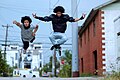 Les Twins mid-air during a shoot with Shawn Welling