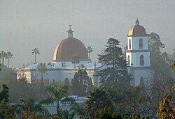 The 85-foot (26 m) high main rotunda and 104-foot (32 m) bell tower make Mission Basilica San Juan Capistrano the tallest building in town. Designed "in the spirit and likeness" of the "Great Stone Church," ground was broken on January 31, 1982. Officially opened on October 23, 1986, the facility was dedicated on February 8, 1987. Pope John Paul II conferred the rank of Minor Basilica to this facility on February 14, 2000.