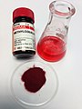 Methylcobalamin: label provides verifiability; sample amount on bottle, watch glass and flask give additional scale reference