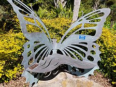 Stylized seat in the shape of a butterfly.