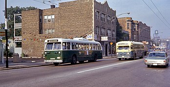 CTA Pullman trolley bus 9338 and UMC bus 131, Irving Park Rd, 1968