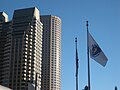 Flag of Massachusetts and office buildings in the Financial District near South Station