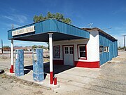 Abandoned Camel Stop Service Station built in 1940 and located on Main Street.