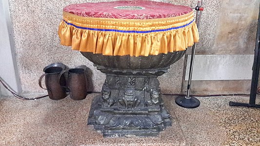 Baptismal font of the church.