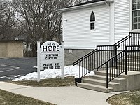 A sign outside a church in Greenbush indicates the church's closing during the pandemic.