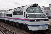 Diesel train forward power car at platform