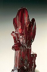 As illustrated by this specimen of proustite, sulfosalt minerals are often deeply colored.