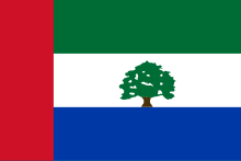 A blue, white, and green flag with a red stripe on the left and a sidr tree in the middle