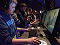 Casual players playing a shooter at the 2013 Intel Extreme Masters in Katowice, Poland.