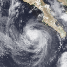 A satellite image of a tropical storm off the west coast of the southern Baja California peninsula