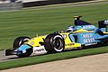 Renault's return in 2002年 saw the traditional yellow combined with the light blue of Mild Seven. This is Jarno Trulli driving the Renault R23 in 2003