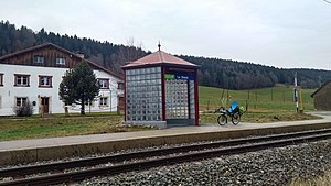 Shelter on platform next to railway line