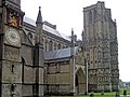 The north transept with its Medieval clock face, the north porch and north-west tower.