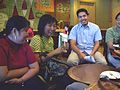 Tin Mandigma accepts a book from Nino Gonzales, serving as a token of apprecation for her presence in the Filipino Wikipedian's 3rd meet-up.