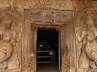 Ornate doorjamb and Dwarapalakas in relief in Vaidyeshvara temple