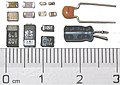 SMD capacitors, with two through-hole ones for comparison