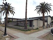 The Myrtle Apartments built in the early 1900s located on the corner of Myrtle & 57th Dr.