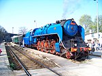 A preserved steam locomotive and excursion train in Braník, Prague, the Czech Republic