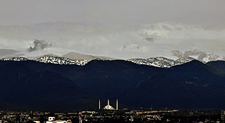 The mosque and Snow-capped Margalla Hills