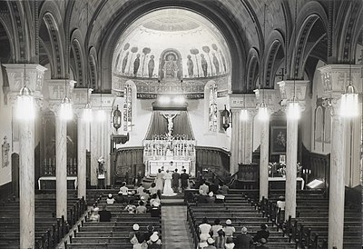 August 6, 1952 wedding photo shows the beautiful ornamentation on the walls and ceiling.