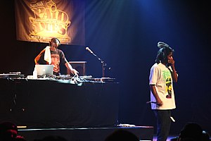 Carter (right) and 9th Wonder performing at Paid Dues in 2008