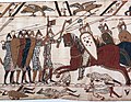 Kite shield on the Bayeux tapestry, where the shield can be seen as being used "point-down" and protecting the leg by the foot soldiers, and not by the mounted soldiers, contrary to popular misconceptions