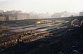 Old Bradford Forster Square station prior to demolition in 1990. Construction workers can be seen in the foreground ready to start work on the new station