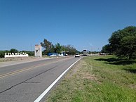 Motor vehicles at the east entrance to Chamical on Argentina Route 38