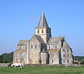 Abbaye Cerisy le Foret, Normandy, France, has a compact appearance with aisles rising through two storeys buttressing the vault.