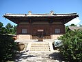 The Great Buddha Hall in Nanchan Temple on Mount Wutai, Wutai County, Shanxi, China, dating back to the Tang dynasty (618-907) and exhibiting a Xieshan roof; this is China's oldest existing timber building.