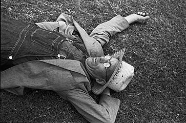 A resting farmer in Crowley, 1938